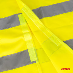 Gul sikkerhedsvest med refleksdetaljer